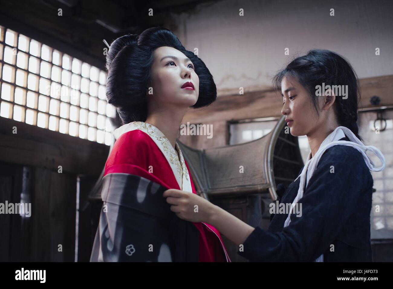 The Handmaiden  Ah-ga-ssi  Year : 2016 South Korea  Director : Chan-wook Park  Min-hee Kim, Kim Tae-ri   Photo: Jae-Hyeok Lee.  It is forbidden to reproduce the photograph out of context of the promotion of the film. It must be credited to the Film Company and/or the photographer assigned by or authorized by/allowed on the set by the Film Company. Restricted to Editorial Use. Photo12 does not grant publicity rights of the persons represented. Stock Photo