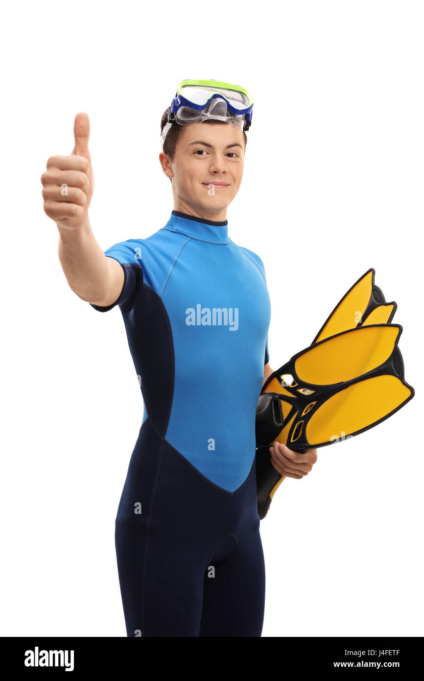 Teenage boy with snorkeling equipment making a thumb up sign isolated on white background Stock Photo
