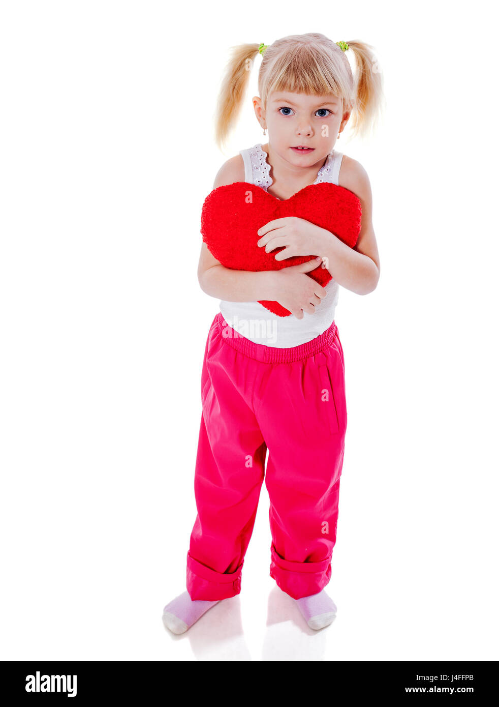 Little Girl in love holding heart isolated on white Stock Photo - Alamy