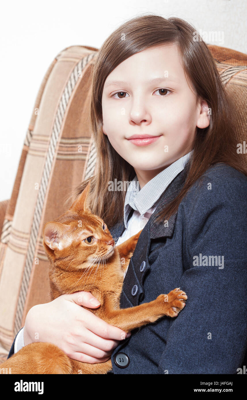 Teen School Girl holding cat pet sitting portrait Stock Photo Alamy