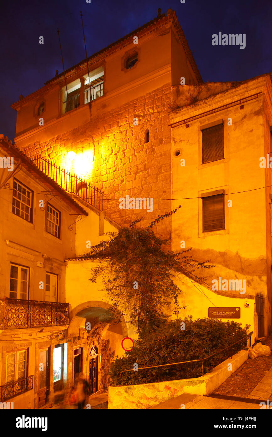 Torre de Almedina at dusk, Old Town, Coimbra, Portugal, Europe  I Stadtturm torre de Almedina , Altstadt, bei Abenddämmerung, Coimbra, Beira Litoral,  Stock Photo