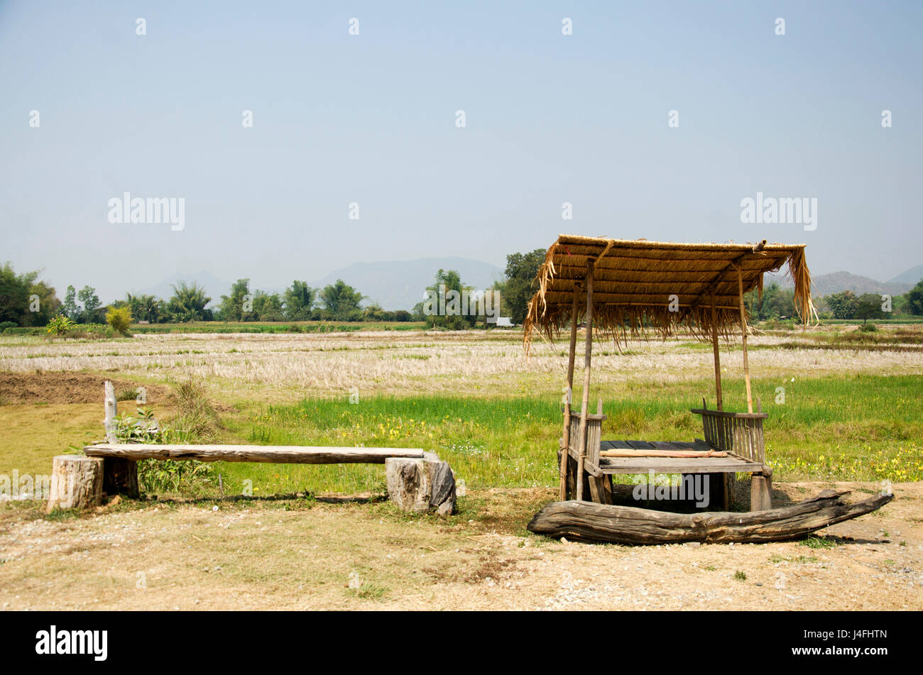 Hut And Bench In Garden With Landscape Rice Field At Thai Dam