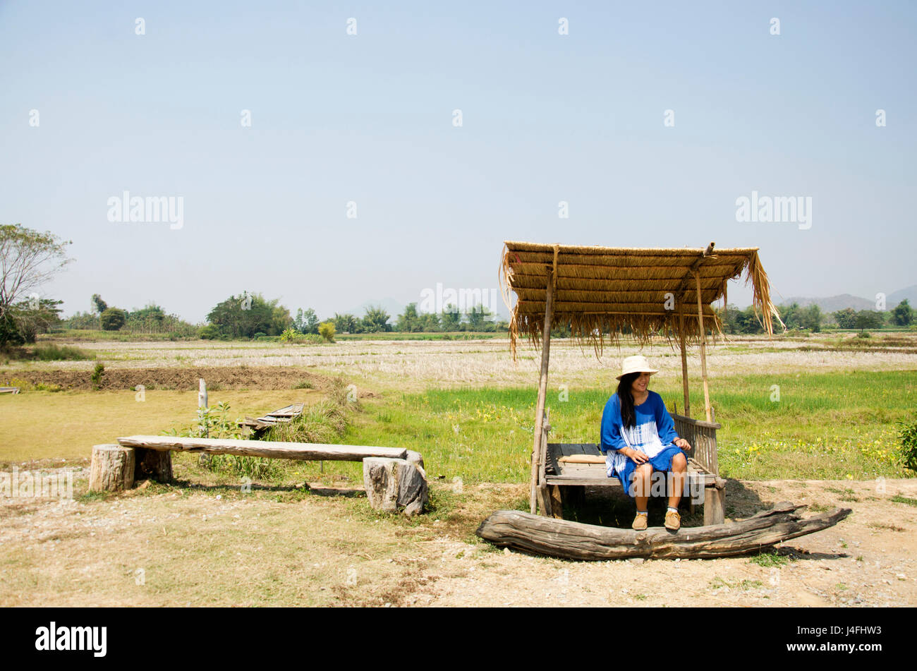 Thai Women People Travel And Posing Sit In Hut At Garden With