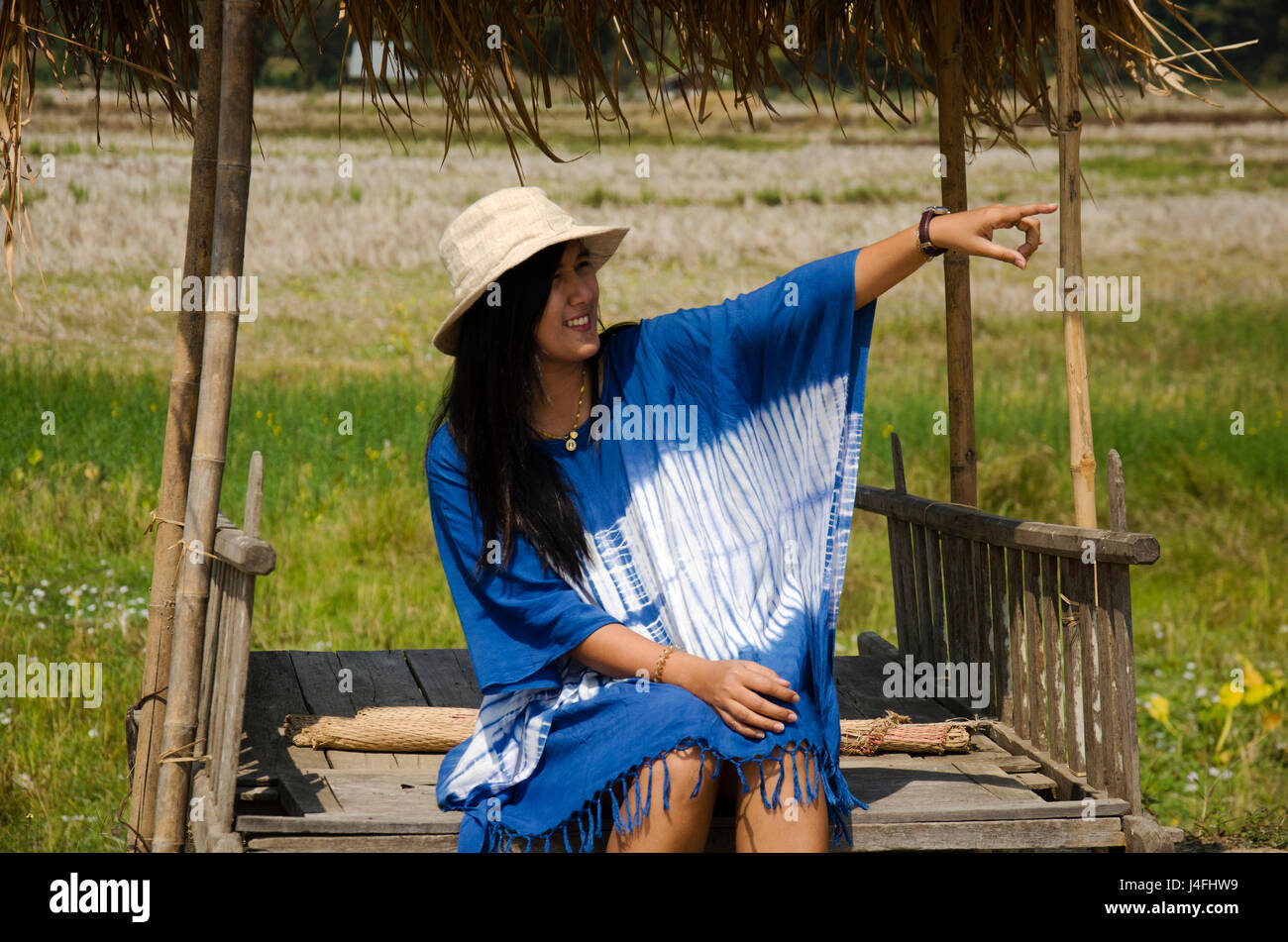Thai Women People Travel And Posing Sit In Hut At Garden With