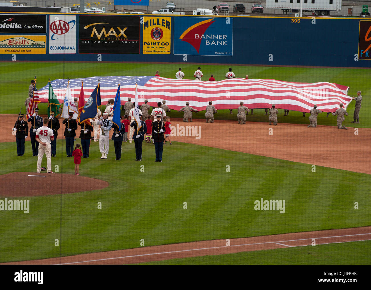 A Fifty Foot Flag Held Aloft By Over 30 Fairchild Airmen And An