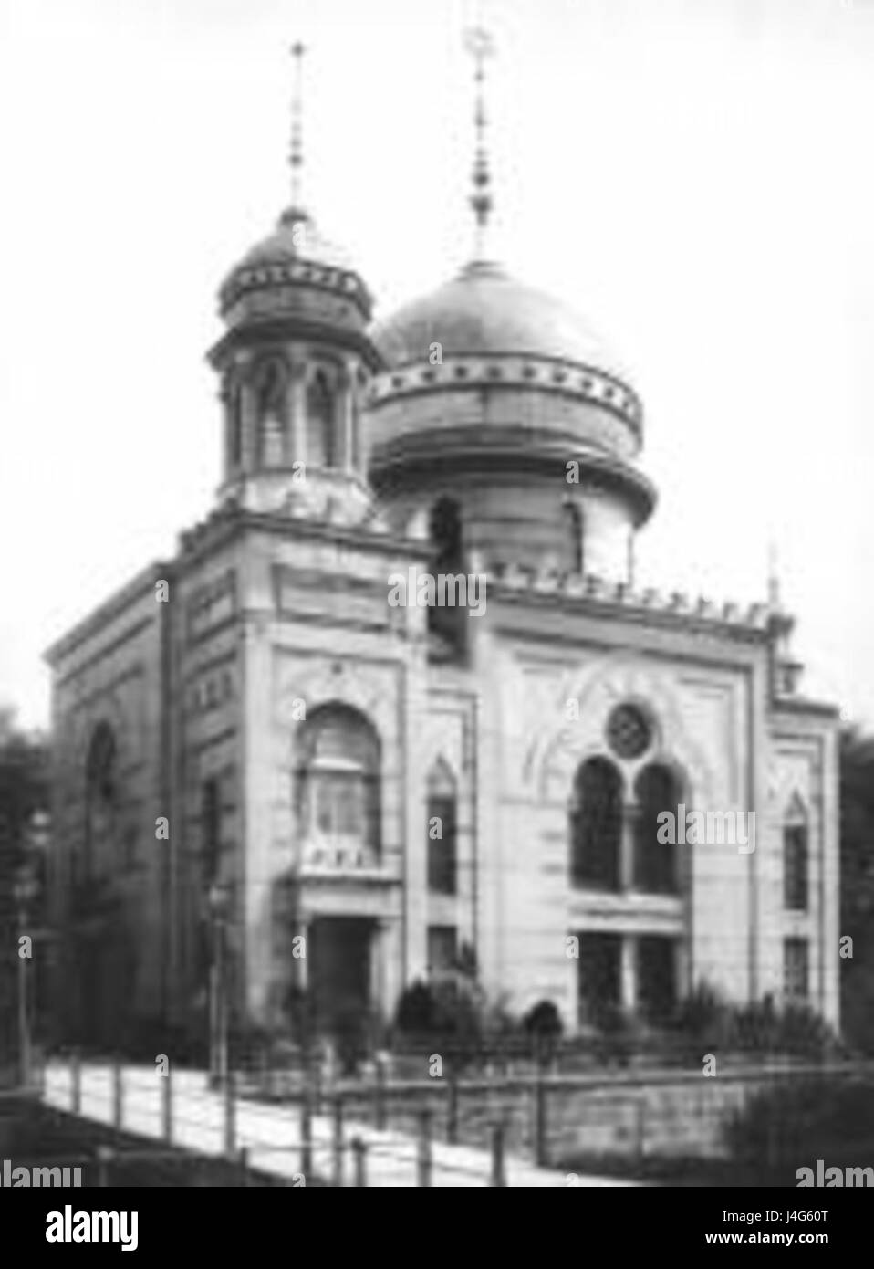 The exterior of the Synagogue in Pforzheim, Germany, showcases the architectural style and cultural significance of the Jewish community in the region. The building features elements typical of early 20th-century synagogues in Europe, reflecting both religious and cultural heritage. Stock Photo