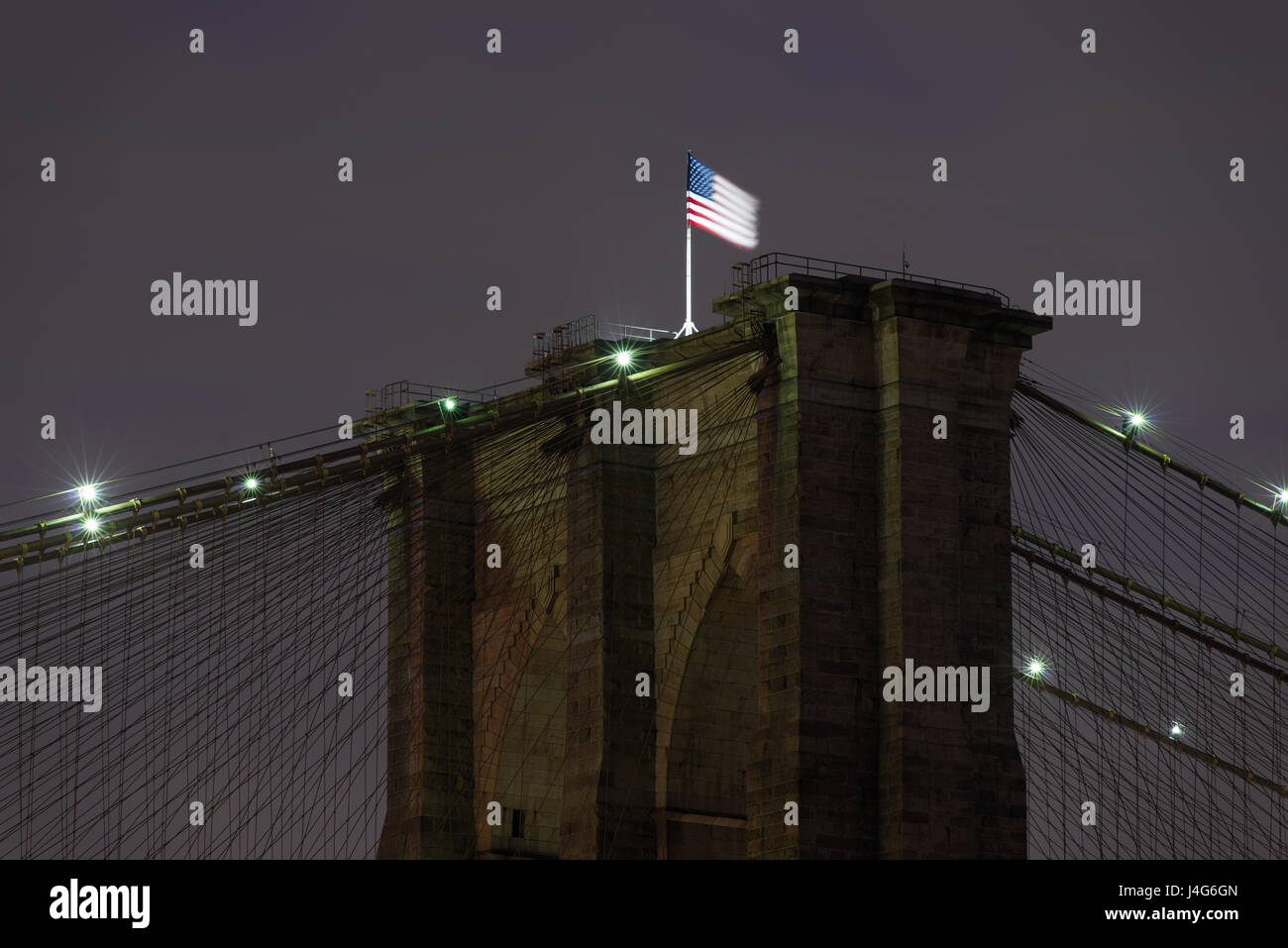 Detail View Of American Flag In Wind On Brooklyn Bridge, New York, USA Stock Photo