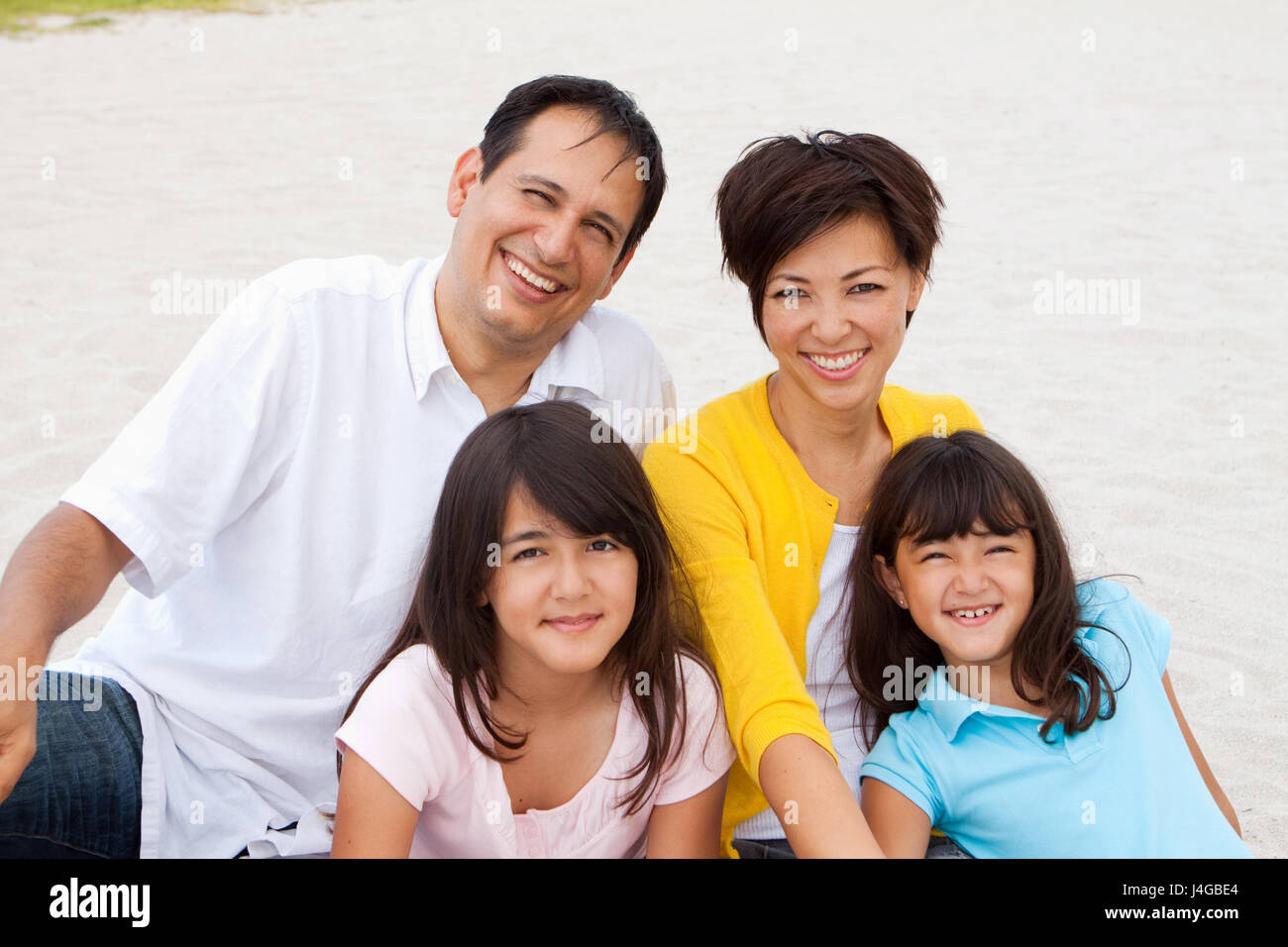 Asian family at the beach hi-res stock photography and images - Alamy