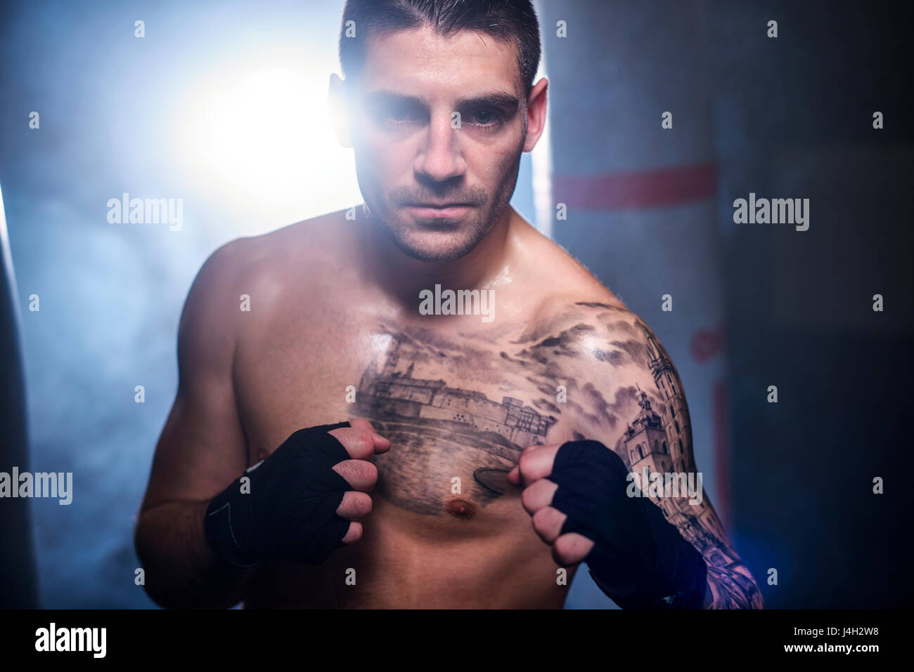 Portrait of boxer keeping guard up Stock Photo - Alamy