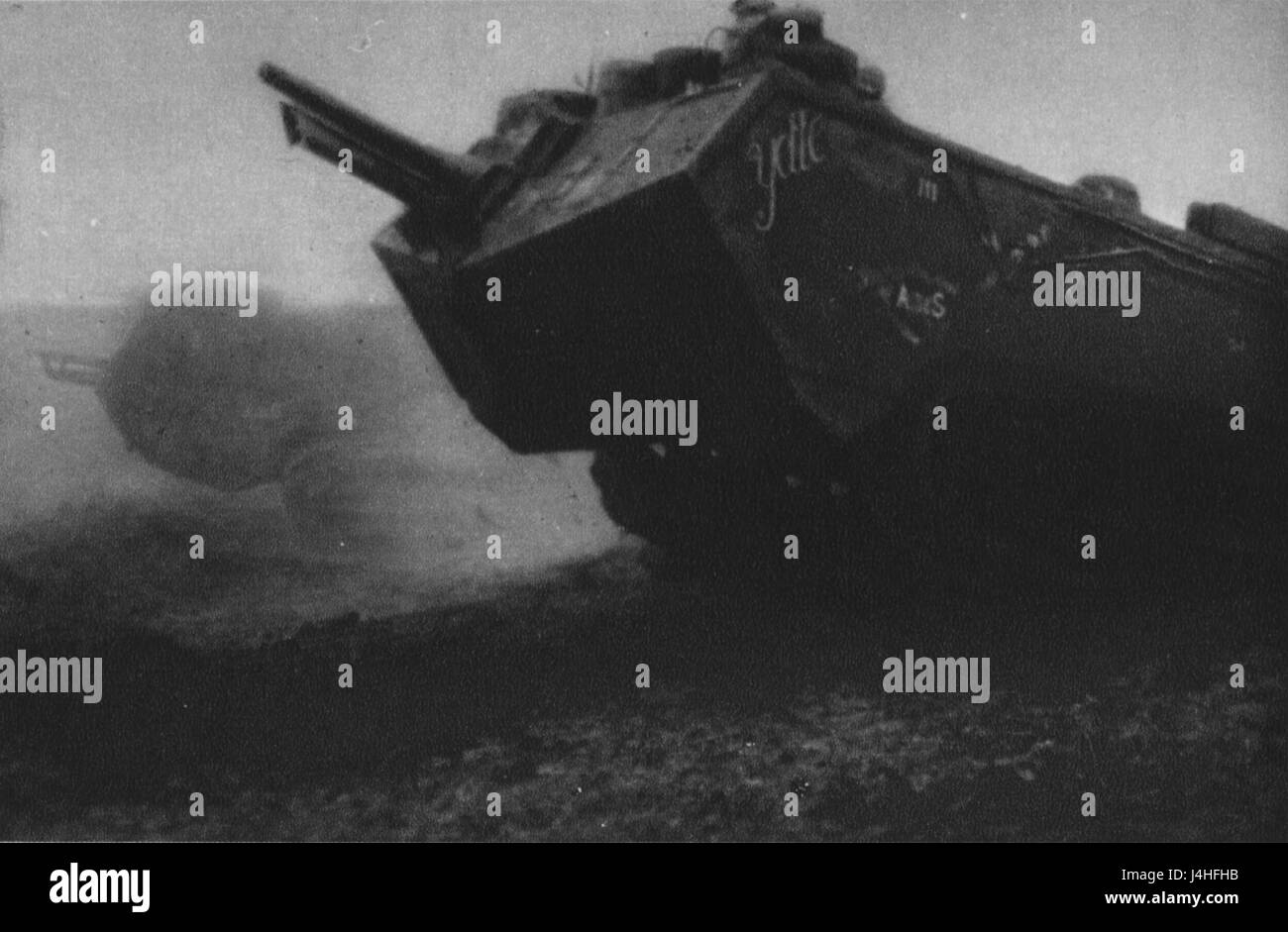 The phrase 'Tankgeschwader geht gegen die deutschen Linien' refers to a historical event during World War II when tank units advanced against German lines. It highlights the intense armored warfare and strategic military movements that characterized this period of conflict. Stock Photo