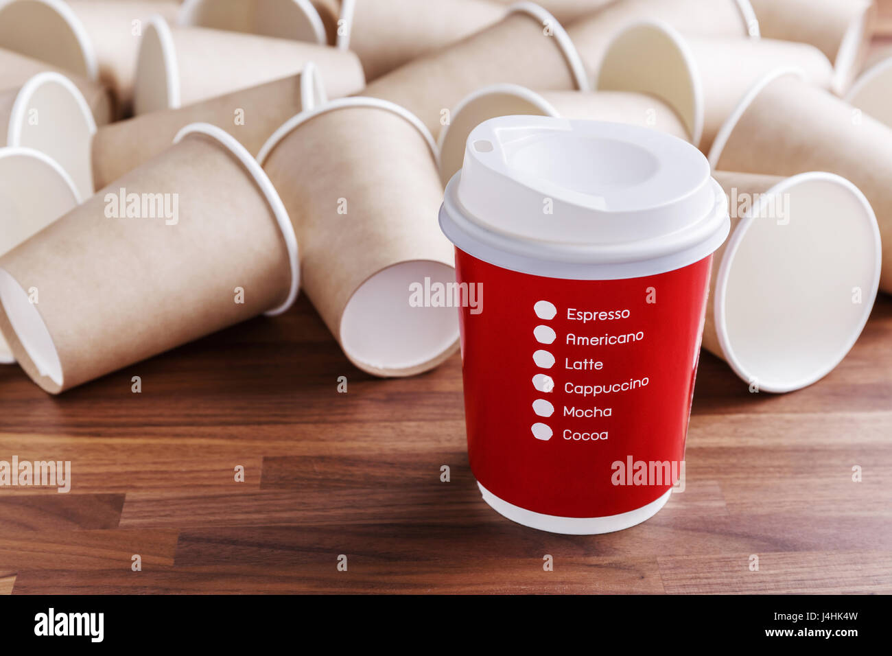Red paper coffee cup with brown paper cups background Stock Photo Alamy