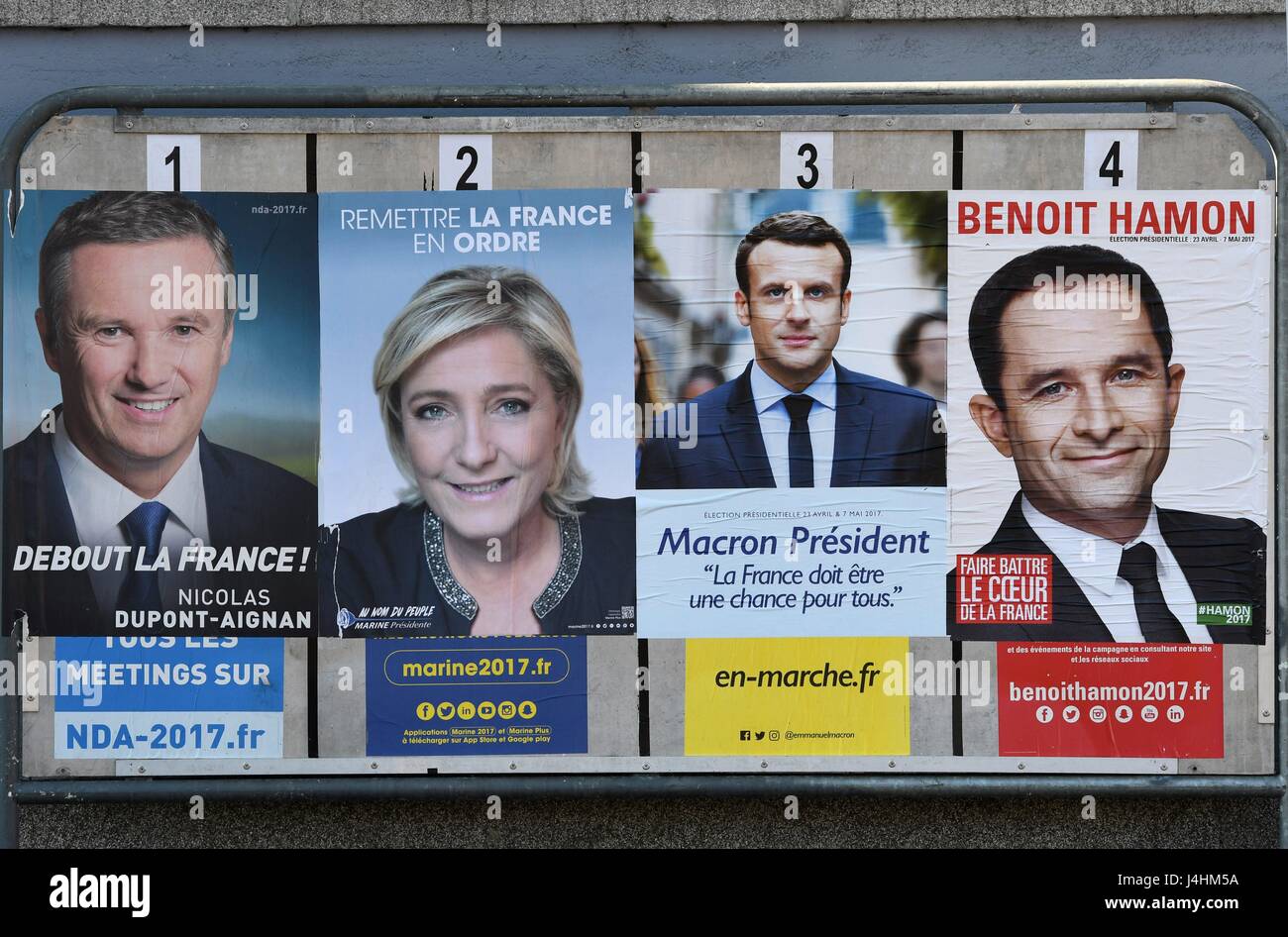 election campaign poster with Marine Le Pen and other candidates ...
