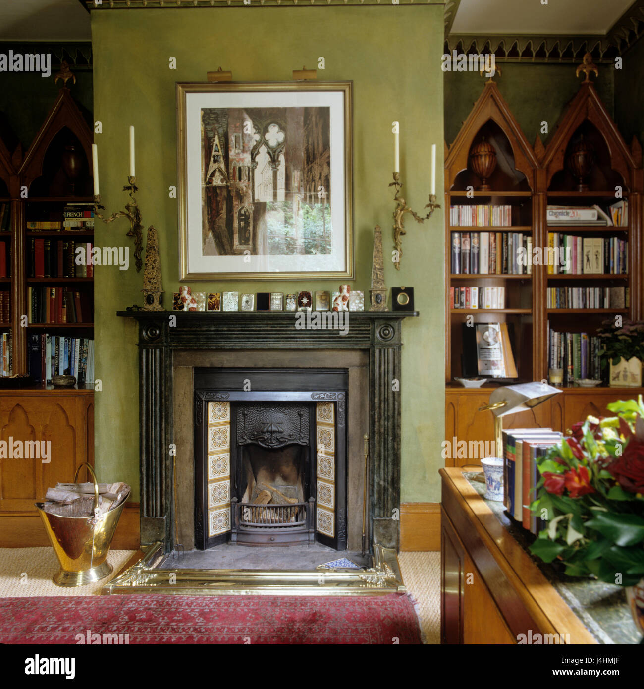 Fireplace With Painting Of Gothic Architecture Stock Photo