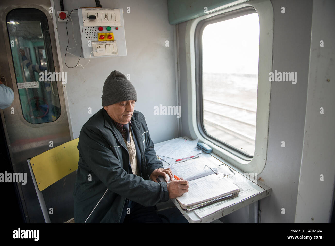Train Conductor Notebook Example On a train writing notes hi-res stock photography and images - Alamy