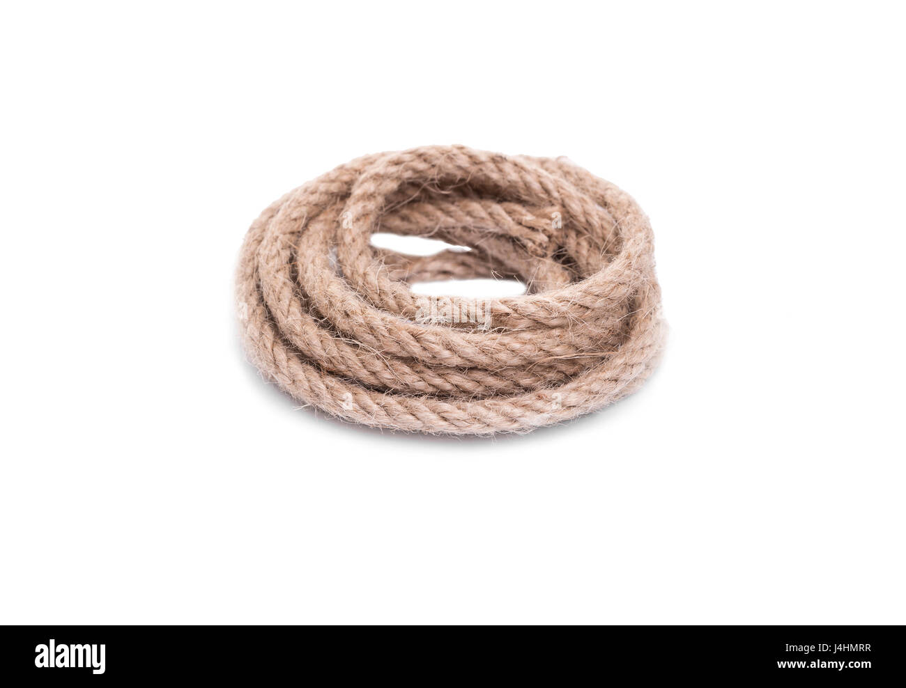 The rope is folded into a ring. Isolated on white background Stock ...