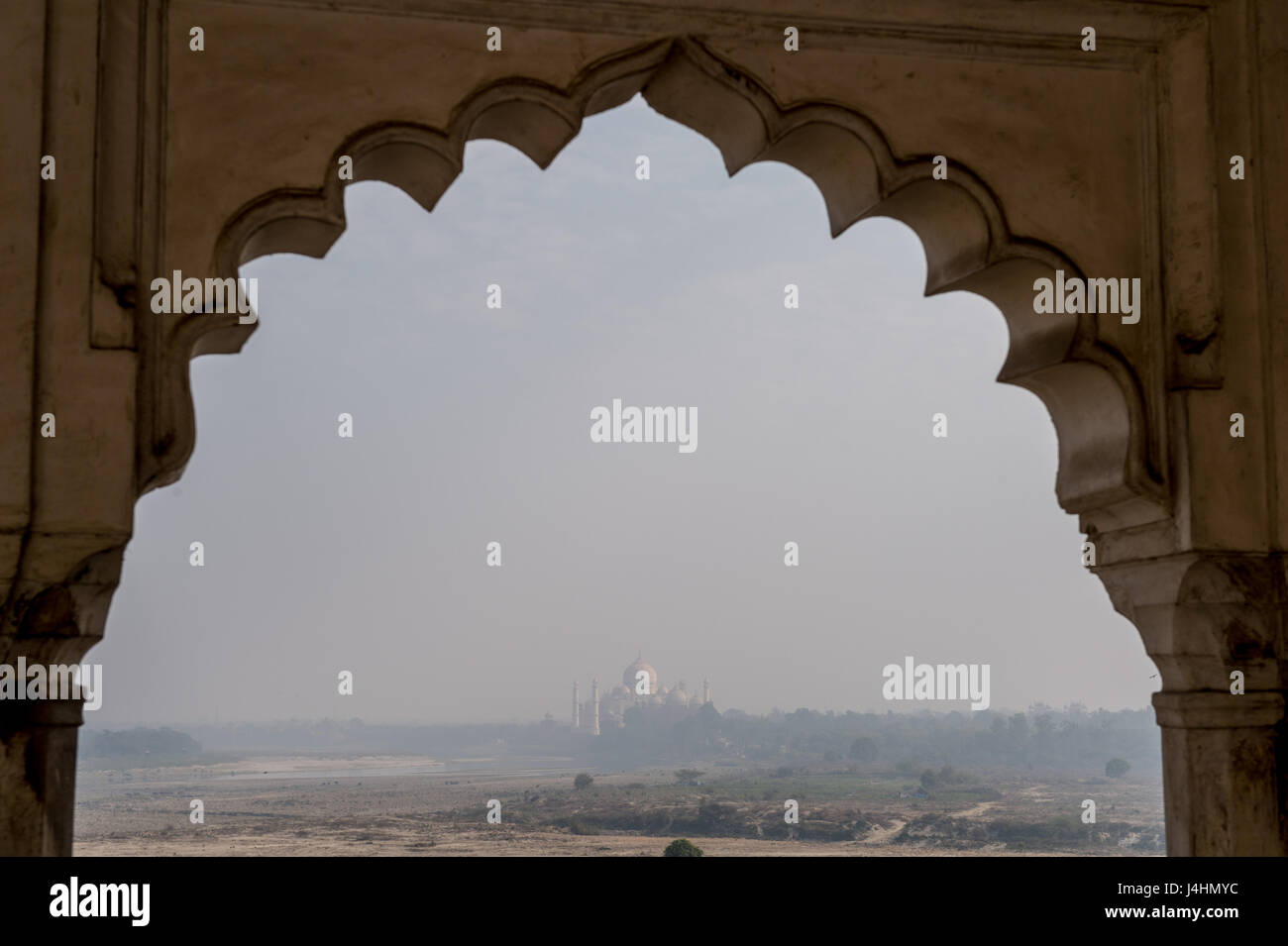 The Taj Mahal seen in the distance from the Agra Fort in Agra, India