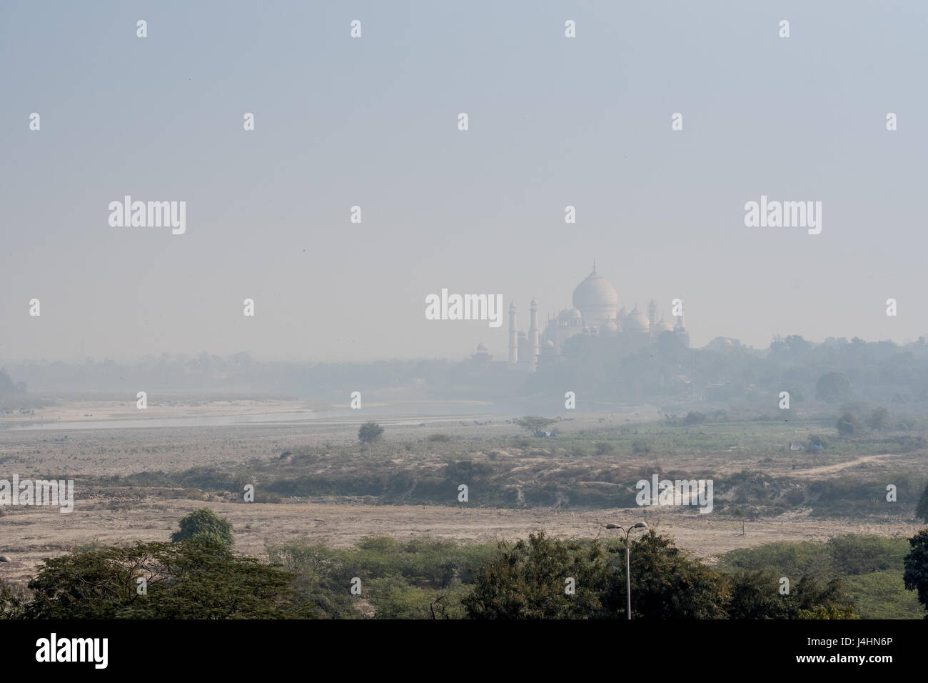 The Taj Mahal in the distance, seen from Agra Fort in Agra, India Stock