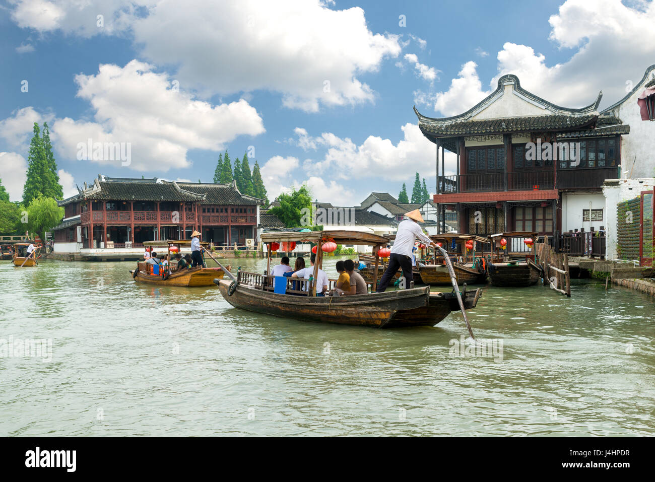China traditional tourist boats on canals of Shanghai Zhujiajiao Water Town in Shanghai, China Stock Photo