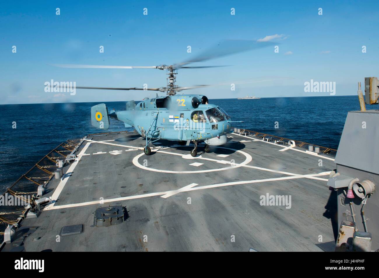 A Ukrainian Navy KA-27 Helix helicopter lands on the flight deck aboard the USN Arleigh Burke-class guided-missile destroyer USS Donald Cook during exercise Sea Breeze September 8, 2015 in the Black Sea.     (photo by Sean Spratt /US Navy  via Planetpix) Stock Photo