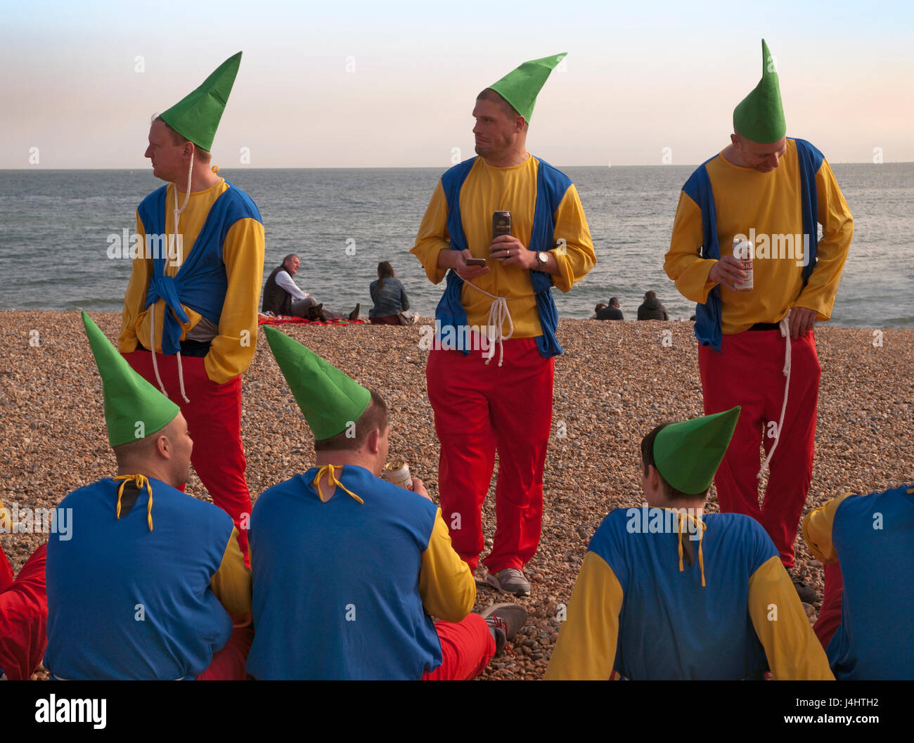 An elf themed stag party on Brighton beach Stock Photo