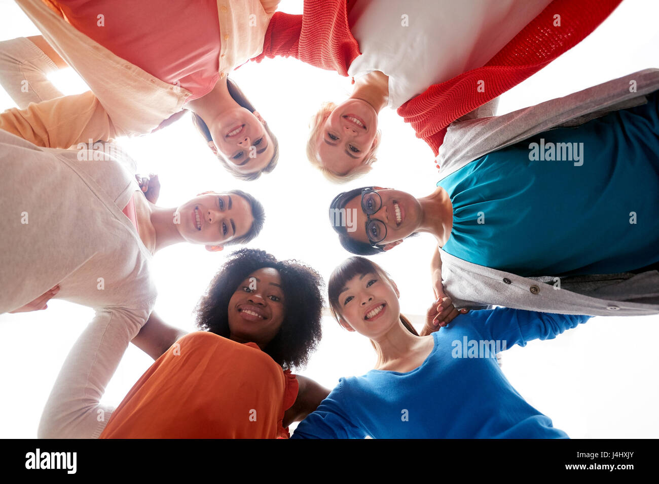 international group of happy smiling women hugging Stock Photo - Alamy