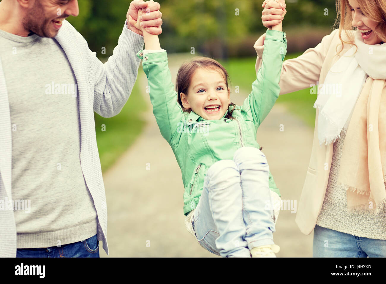 happy family walking in summer park and having fun Stock Photo - Alamy