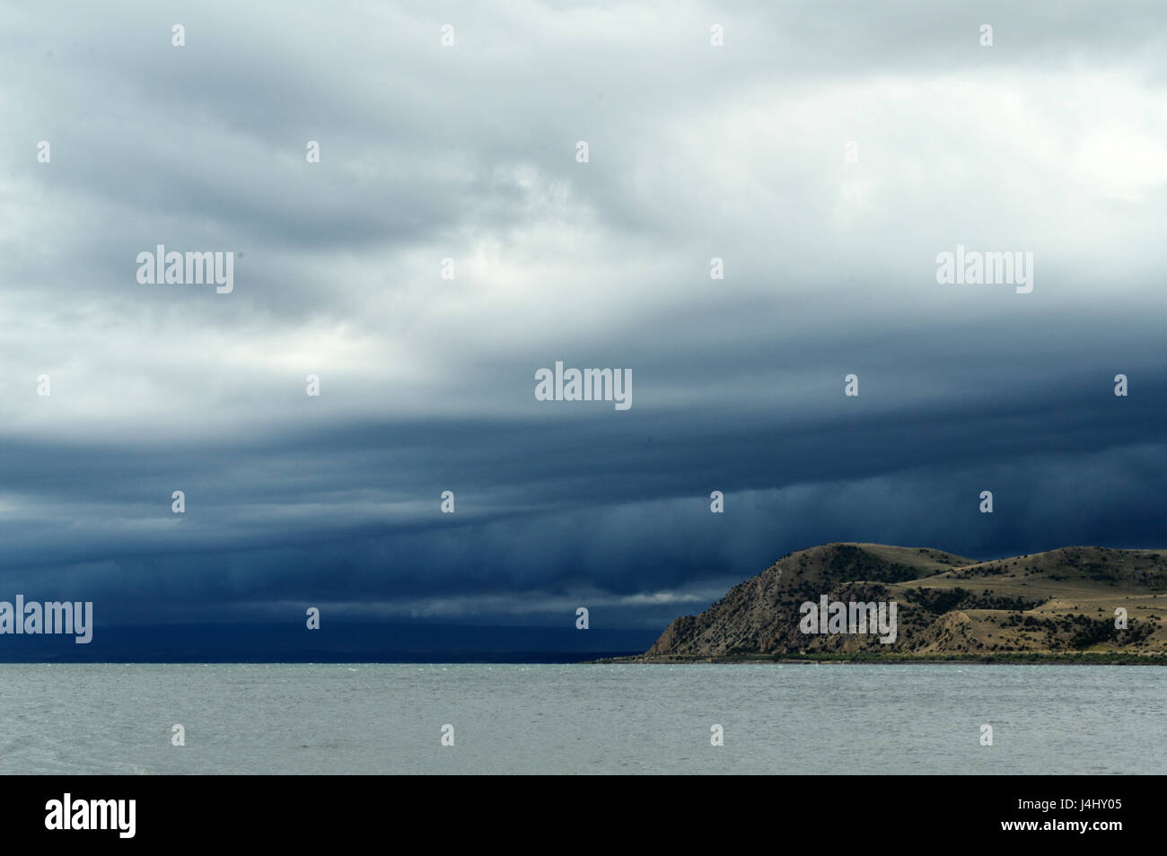 Dramatic clouds over the lake Sevan in Armenia Stock Photo