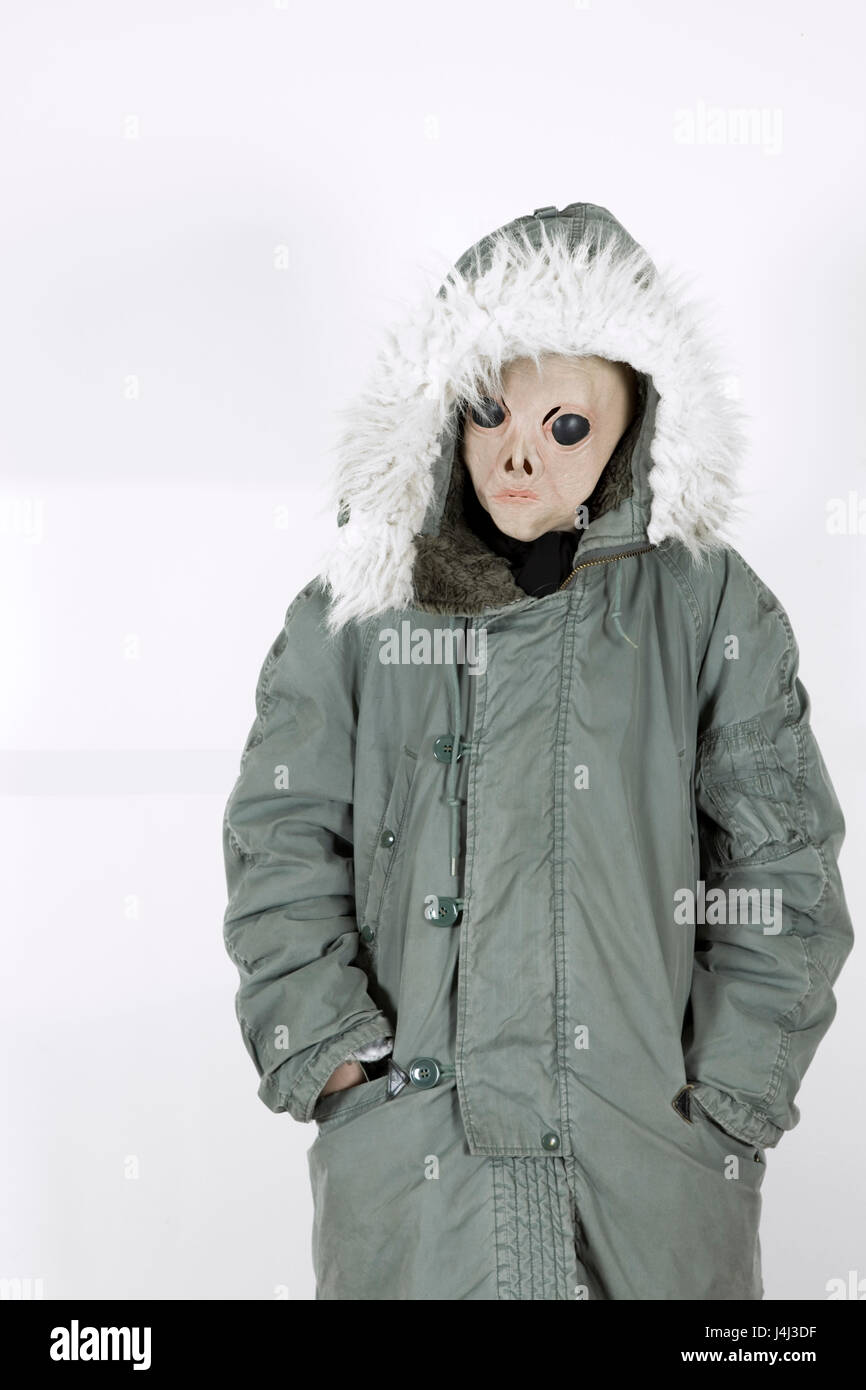 Alien wearing a military coat with hood fake fur Stock Photo - Alamy