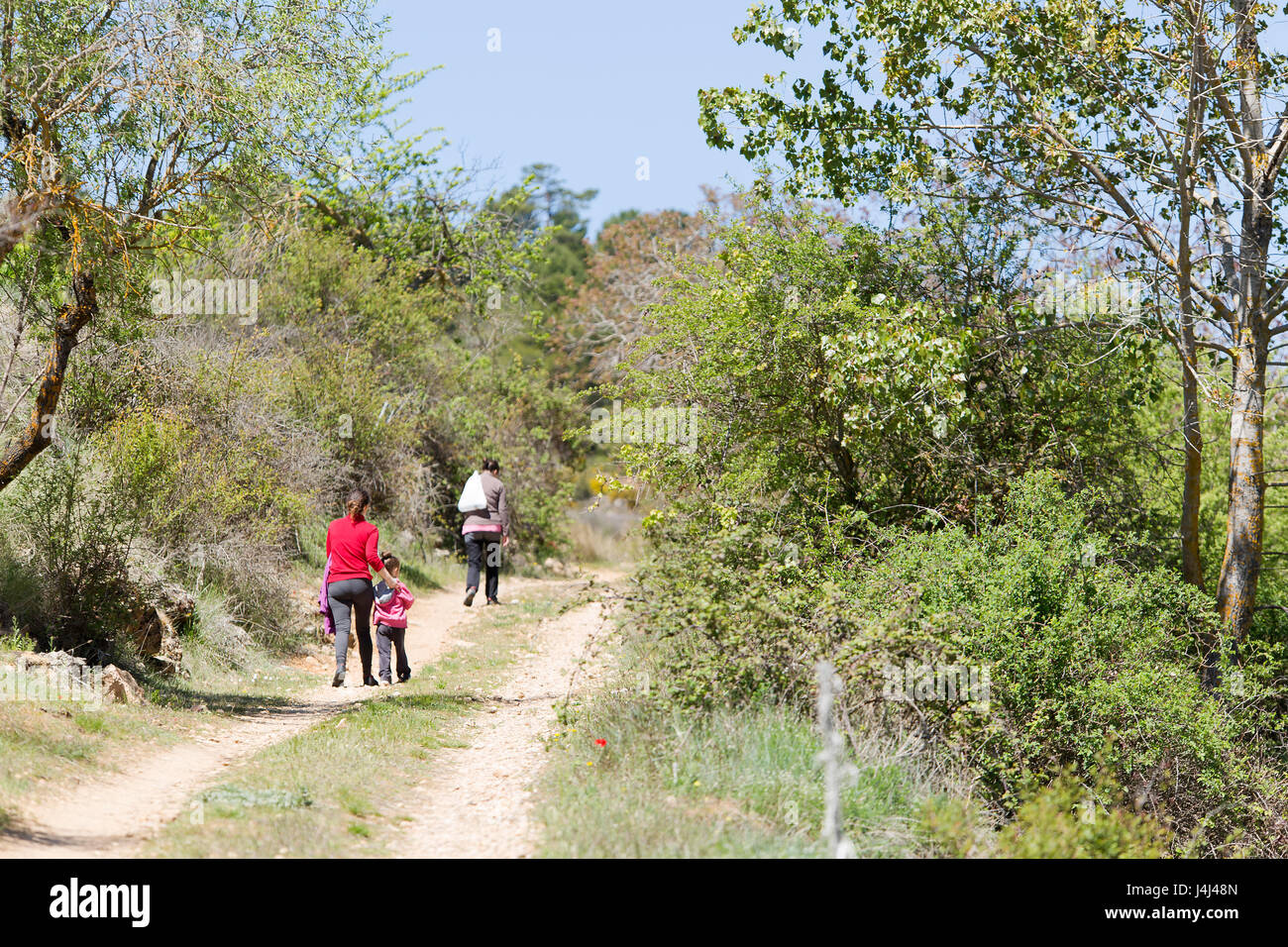 Family hiking in Cañadas de Haches de Arriba, Bogarra province of Albacete in Spain. Stock Photo