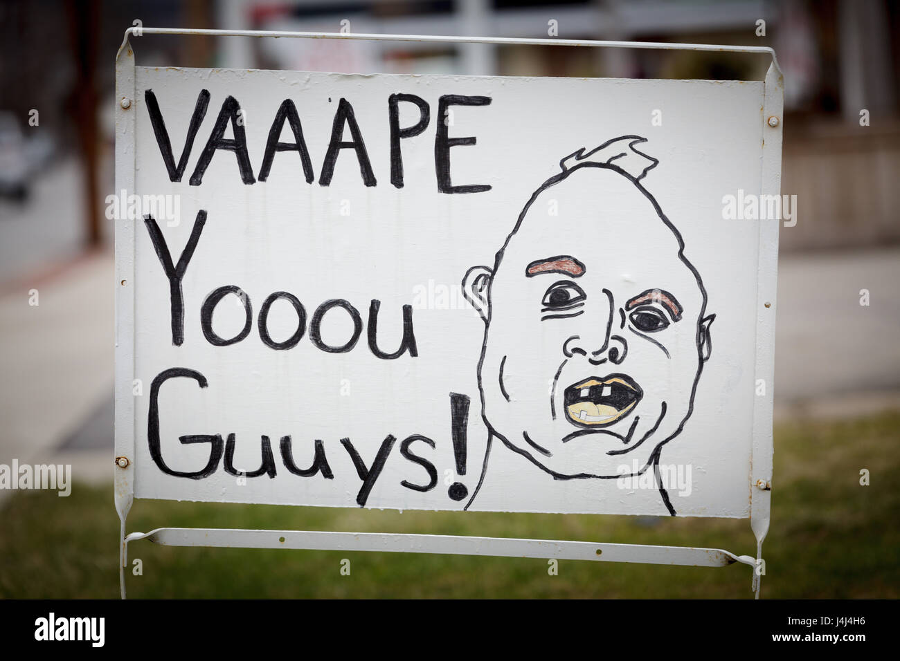 A sign in front of a store that sells vaping supplies, Herkimer, New York State. Stock Photo