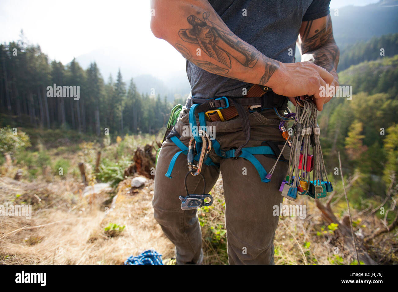 Climber wearing climbing equipment Stock Photo