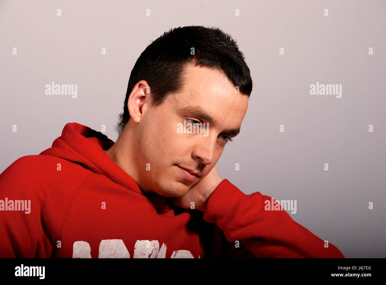 Young man in a studio location - head shot Stock Photo