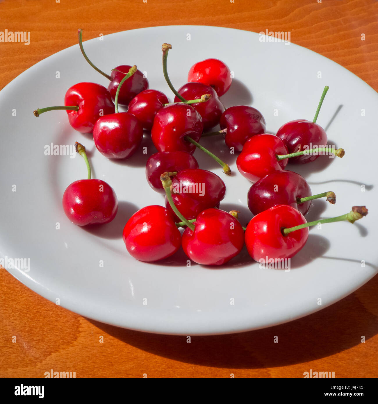 Cherries in the dish to eating Stock Photo Alamy