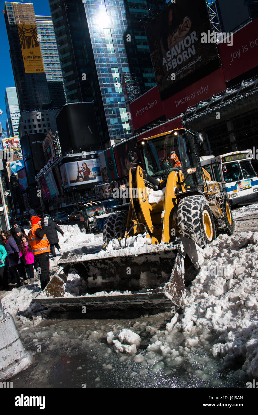 removing the snow on times square aftermath of the snow storm in new ...