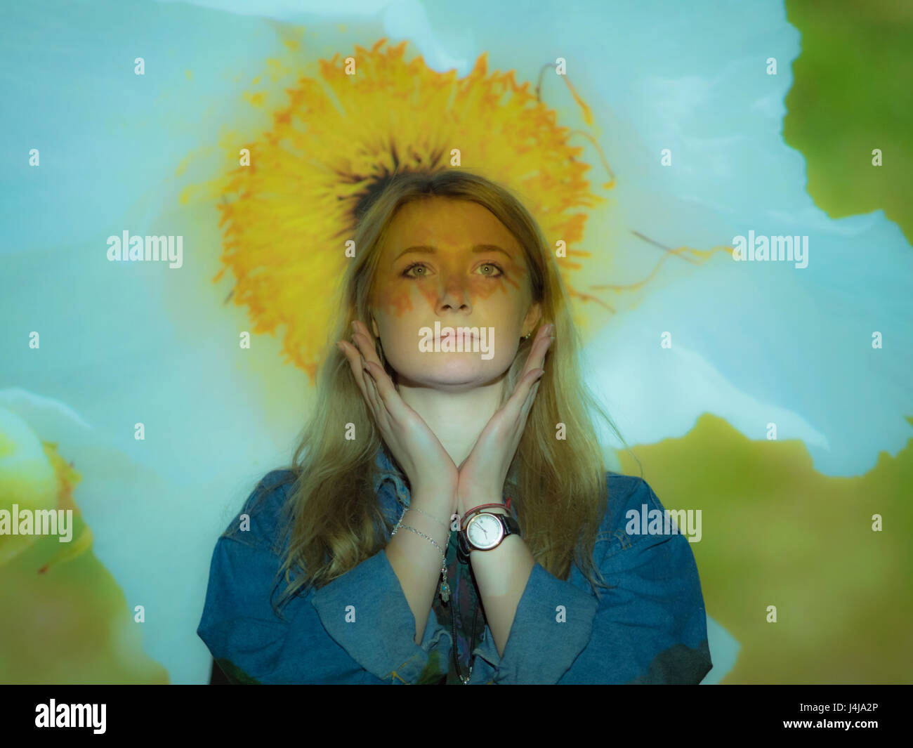 Portrait of a Romneya flower projected onto a girl Stock Photo