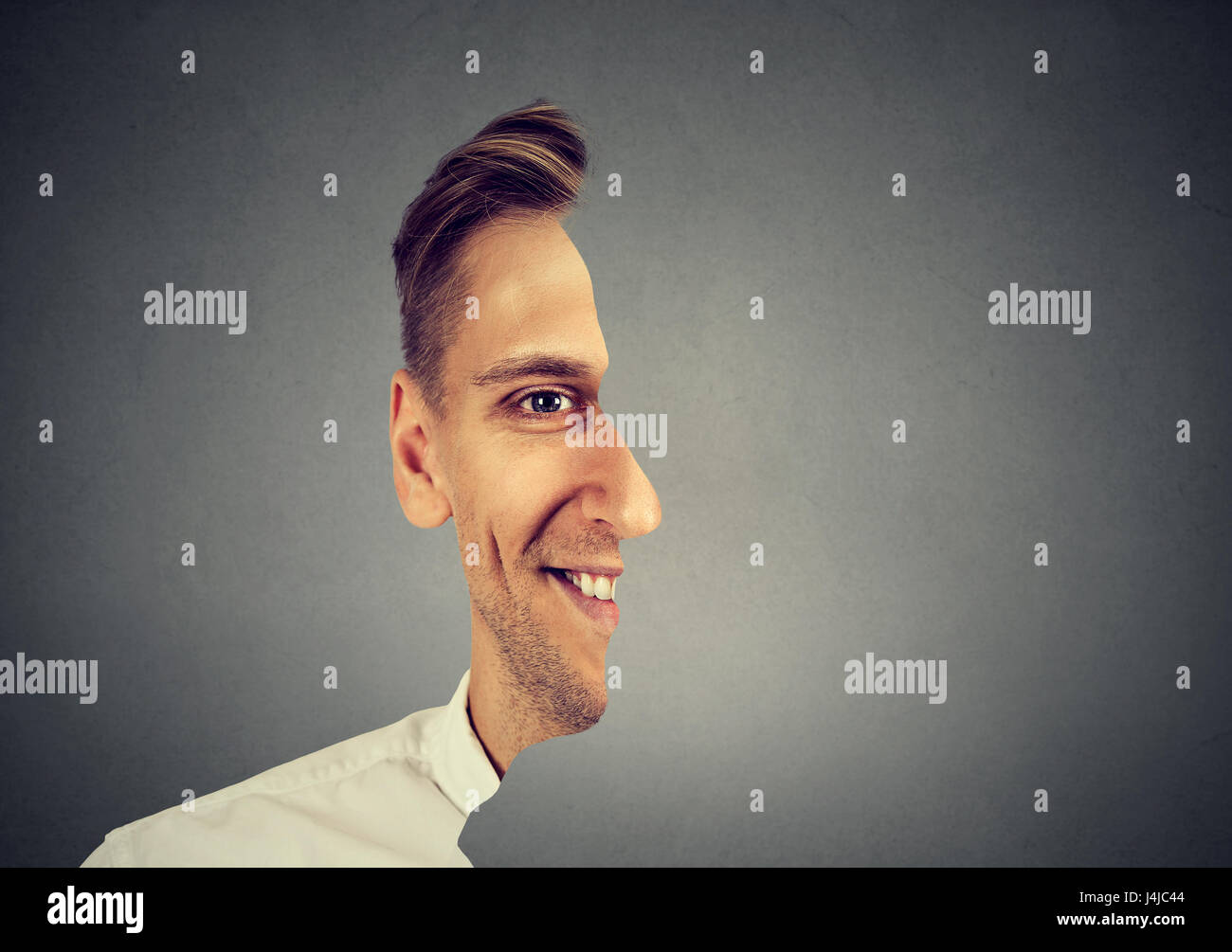 surrealistic portrait front with cut out profile of a man Stock Photo