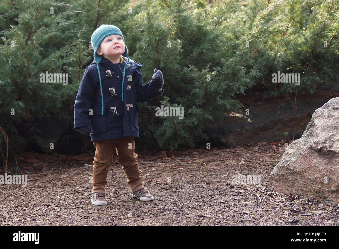 Boy playing outside hi-res stock photography and images - Alamy