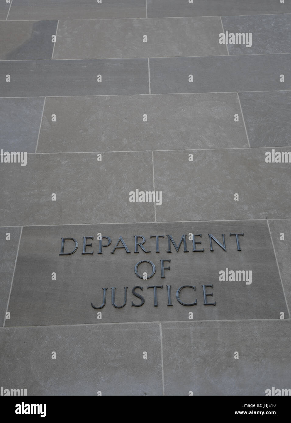 U.S. Department of Justice nameplate on outside of headquarters building, Washington, D.C., USA Stock Photo