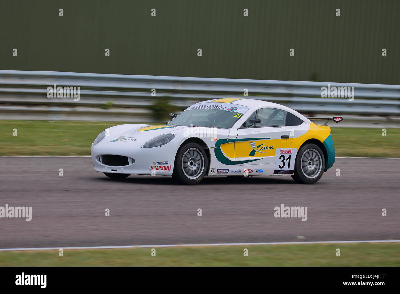Charlie Digby in the Ginetta Junior Cup at Thruxton race course during