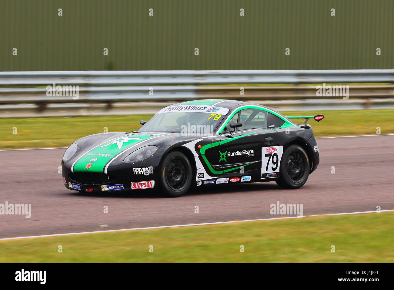 Greg Johnson in the Ginetta Junior Cup at Thruxton race course during