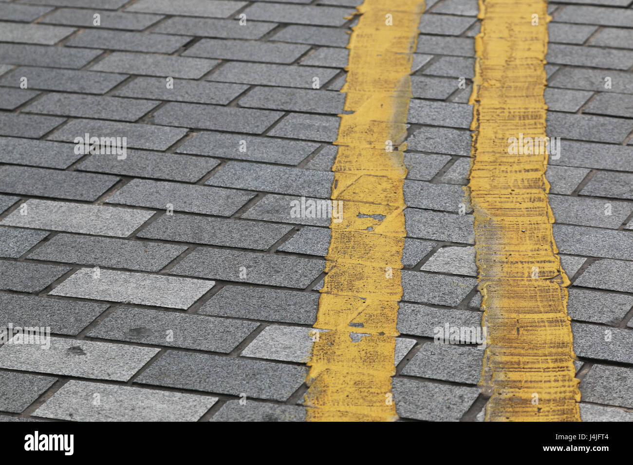 Close up of a double yellow line Stock Photo Alamy