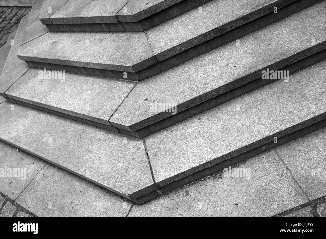 Abstract architecture fragment. Stairway corner made of granite stone blocks Stock Photo