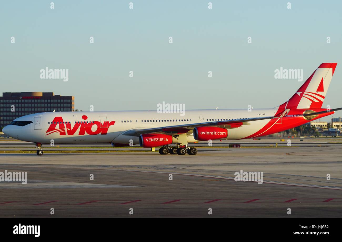An A340 Airbus airplane from Venezuela company Avior Airlines (9V) at the Miami International Airport (MIA) Stock Photo