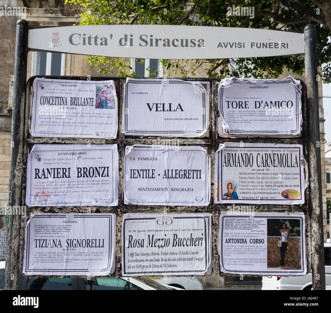 Italy, Sicily, Syracuse, Board with Funeral notices Stock Photo Alamy