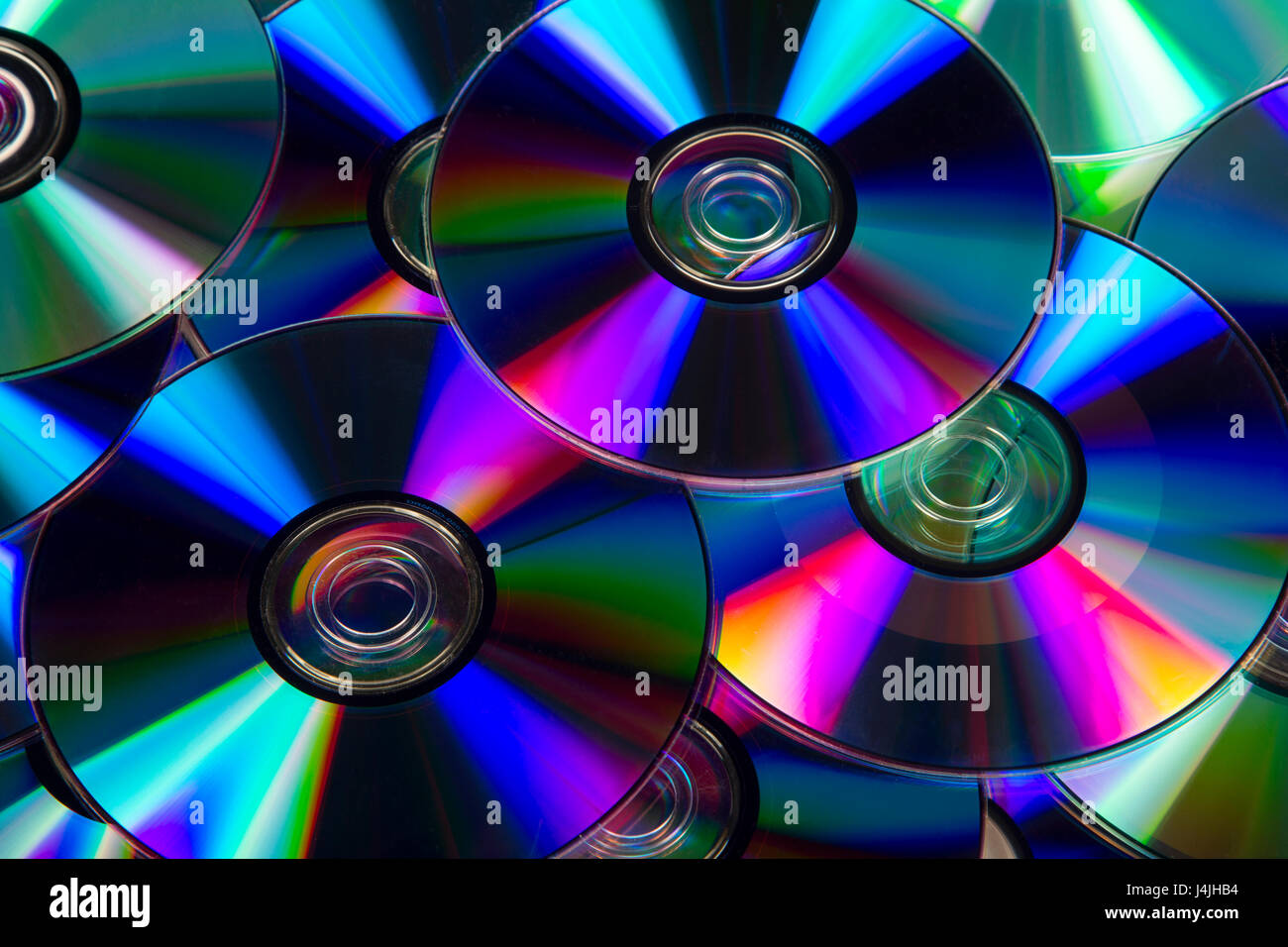 DVDs and CDs background Stock Photo