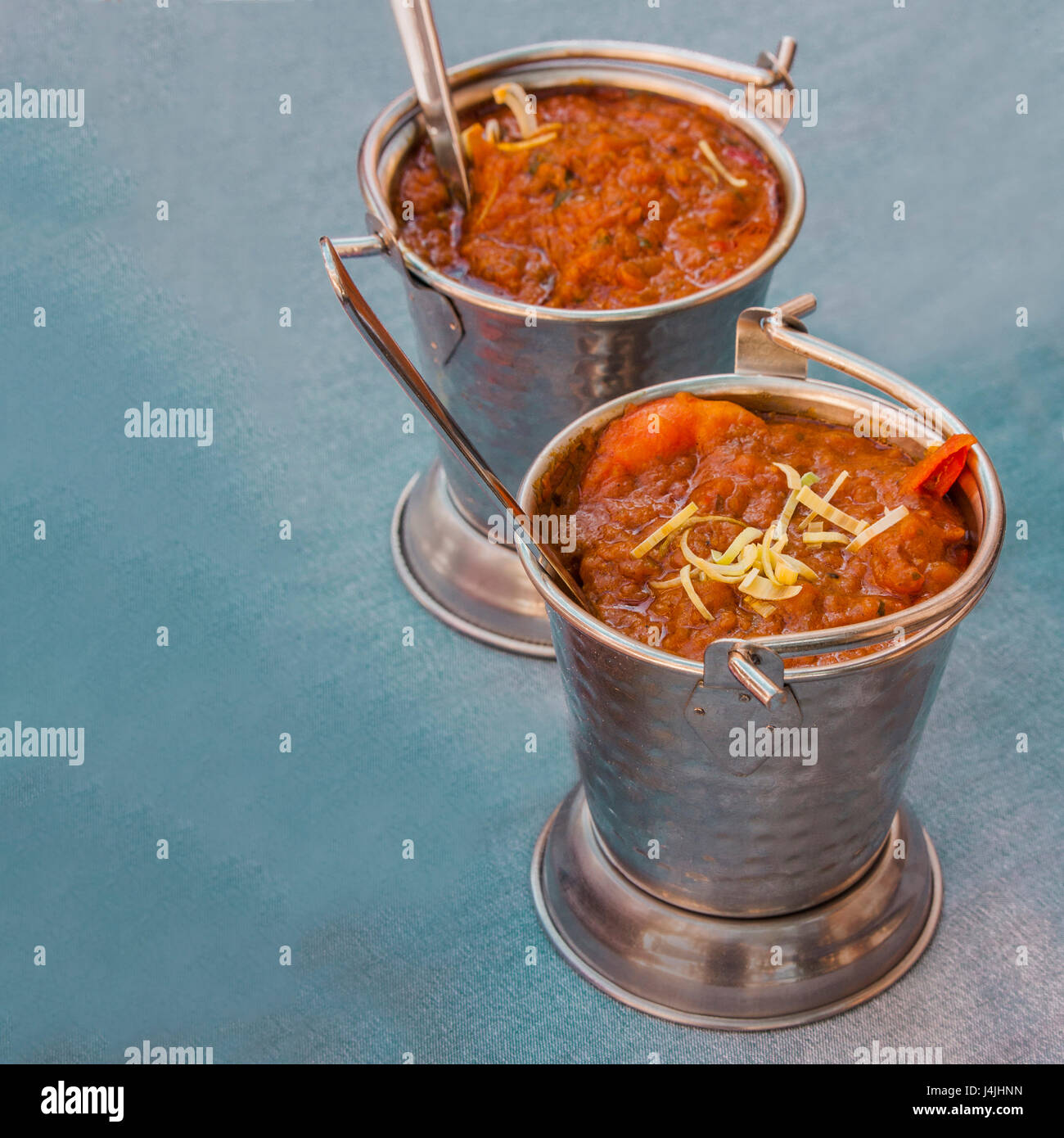 Prawn balti, an Indian dish, served in the typical dishware, square
