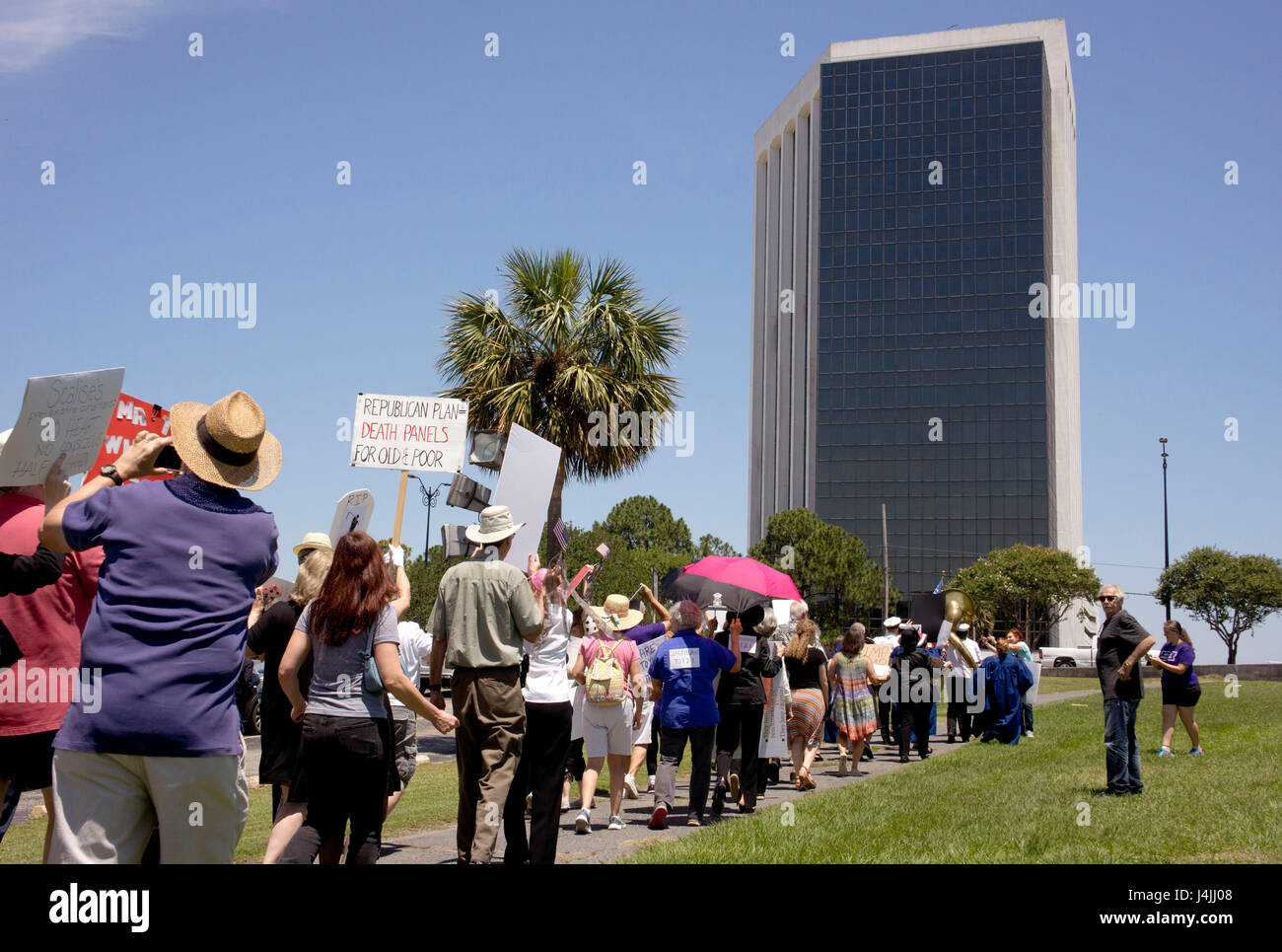 Health Care 'reform' bill protesters outside their state gov't representative's office.  New Orleans, LA.  USA Stock Photo