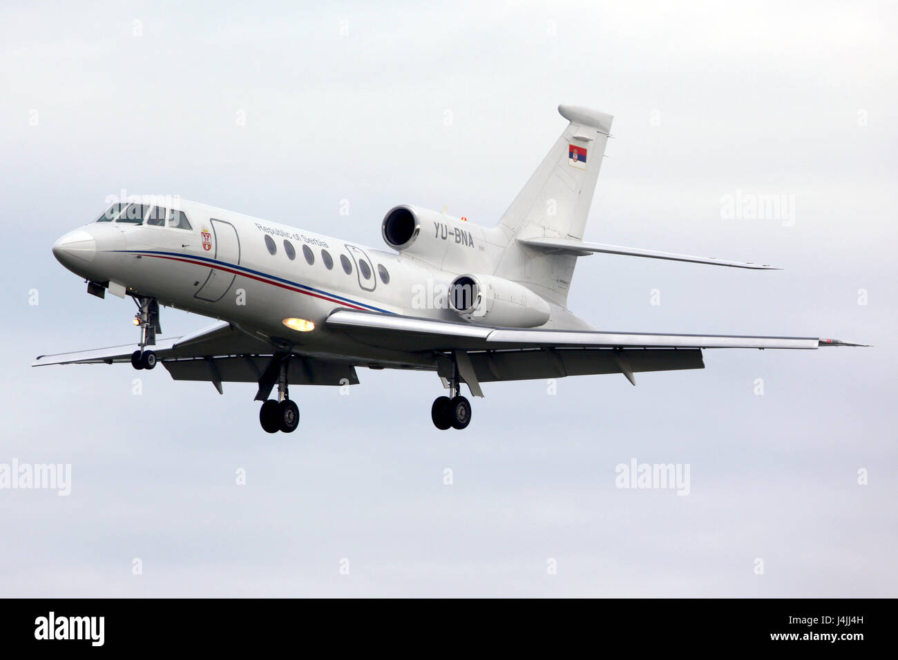 PRAGUE, CZECH REPUBLIC - NOVEMBER 2, 2012: Dassault Falcon 50 YU-BNA of Serbia Government landing at Ruzyne international airport. Stock Photo