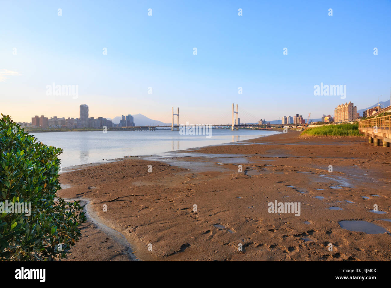 Chung Yeung Bridge (重陽大橋) over the Tamsui River in Taipei in the late afternoon sun Stock Photo