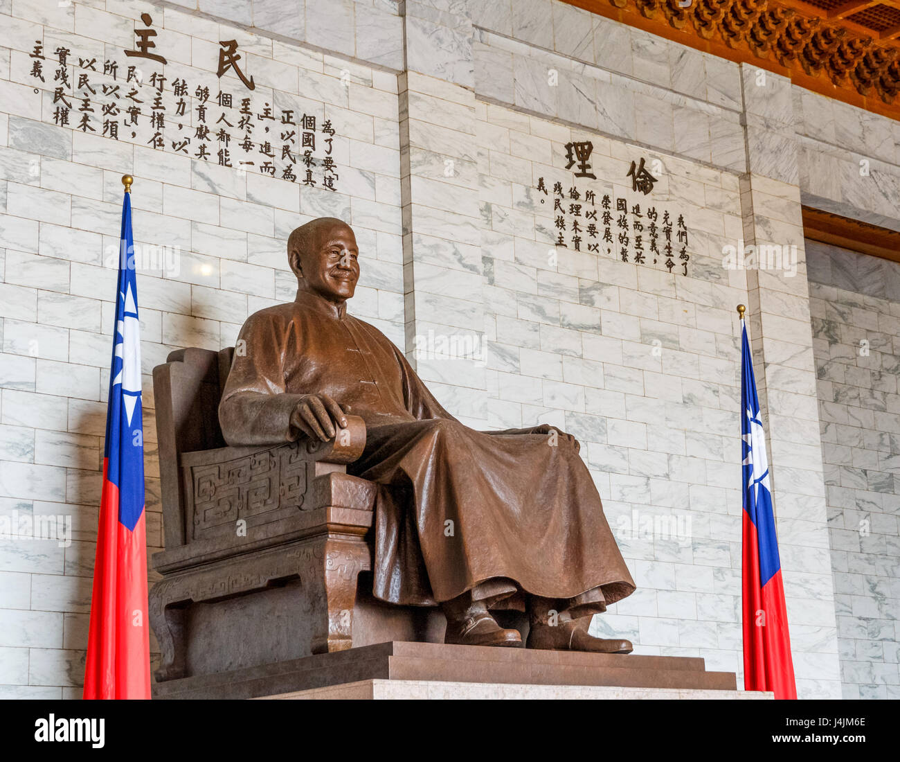 Seated bronze statue of Chiang Kai-Shek at the Chiang Kai-Shek Memorial Hall in Taipei. The statue is 10 meters tall. Stock Photo